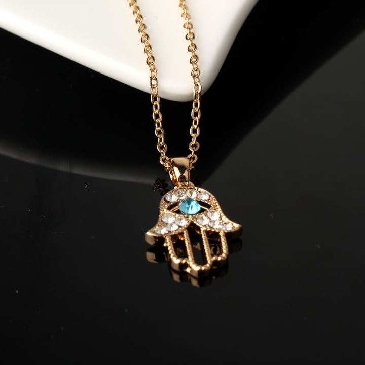Gold Hamsa Hand Evil Eye Necklace